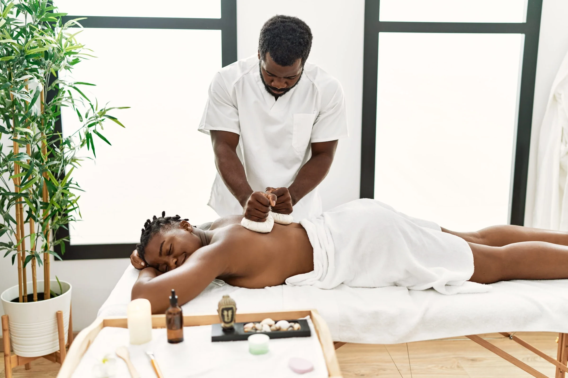 Warm candlelit body treatment room